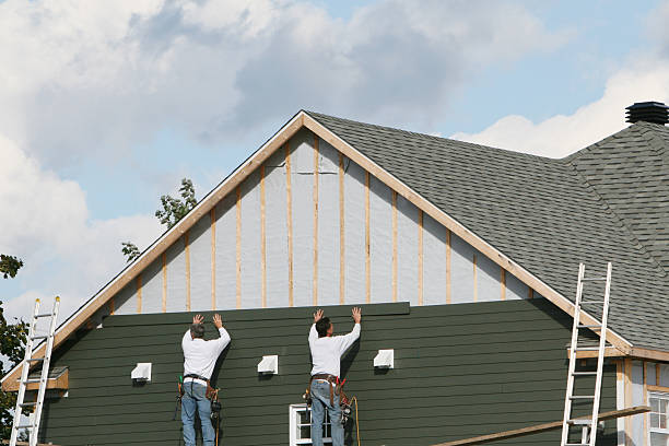 Professional Siding technician working in Fort Loramie, OH